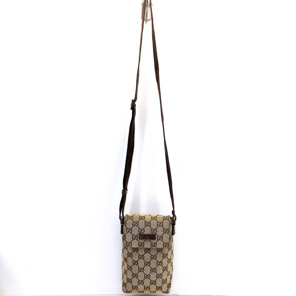 Gucci GG canvas crossbody messenger bag monogram pattern leather